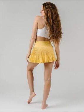 ZYIA Yellow Pleated Mini Skirt
